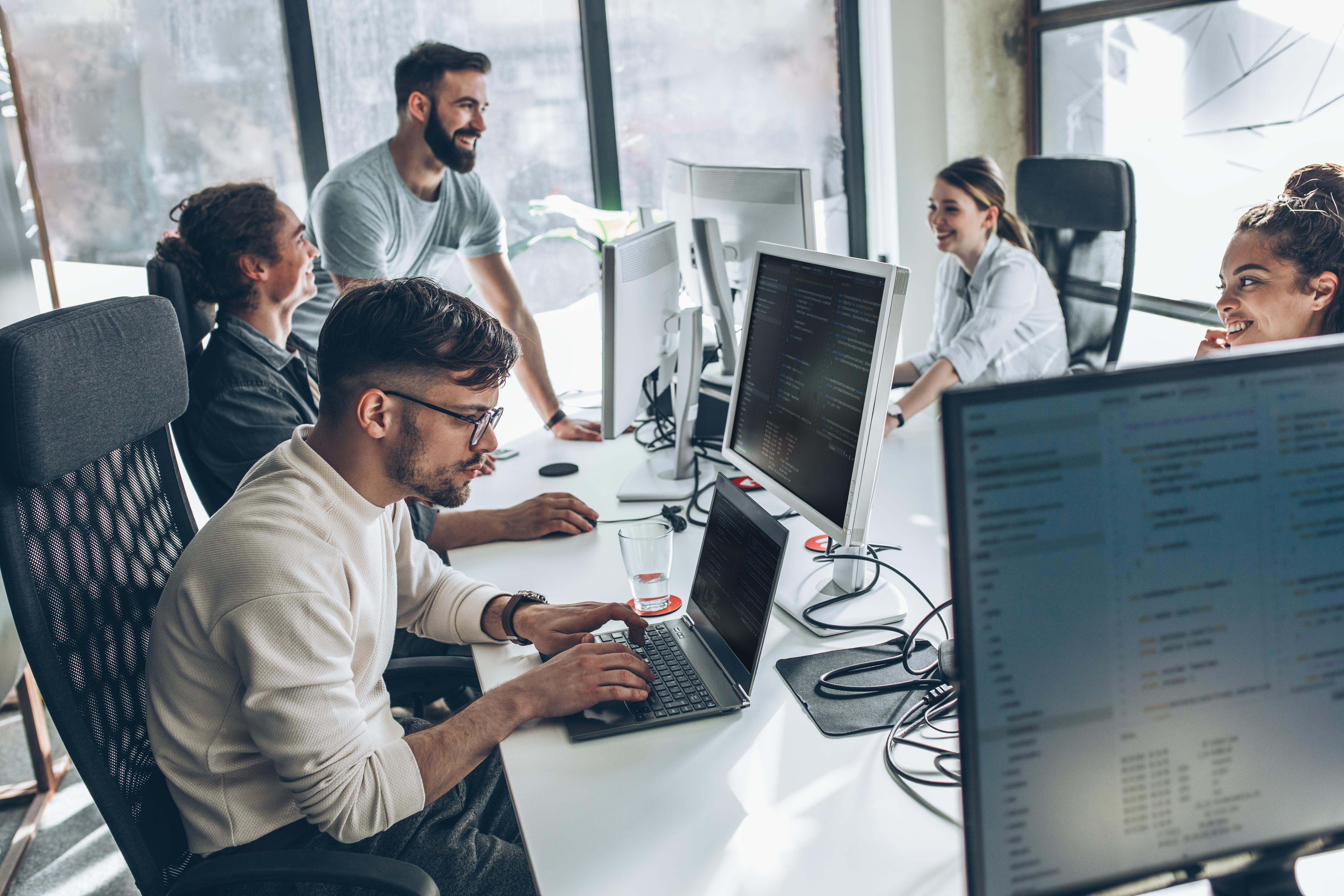 Waazen Tech team working with business technology